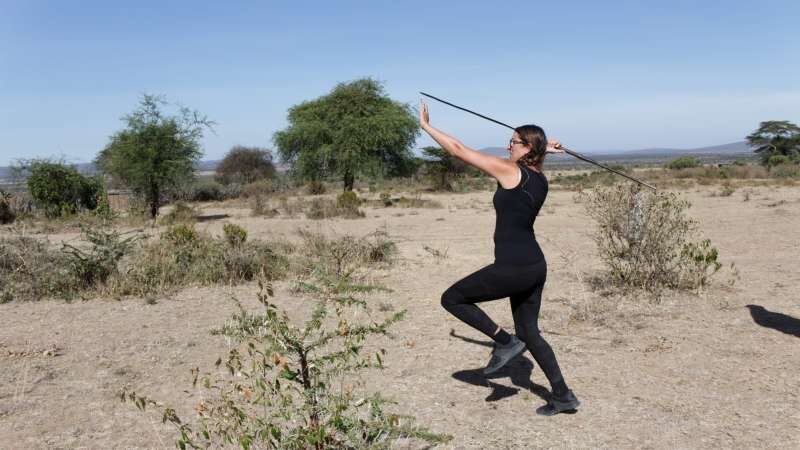 Image of a visitor trying to throw Spear like a Masai worrior. Credit: Intrepid Travels